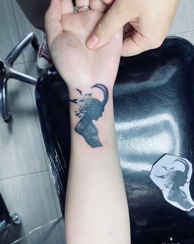 遮盖旧纹身洛基纹身图片_手臂点刺纹身图案