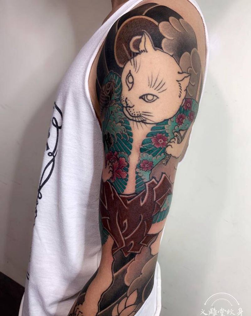 猫臂纹身纹身图片_手臂老传统义雕堂刺青纹身图案