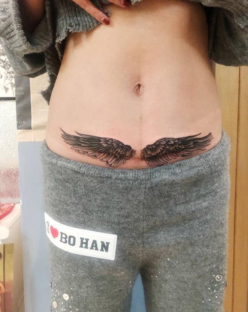 翅膀纹身图片_腹部纹身图案