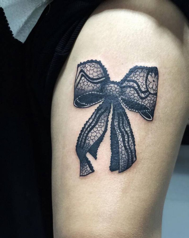 蝴蝶结纹身图片_腿部纹身图案