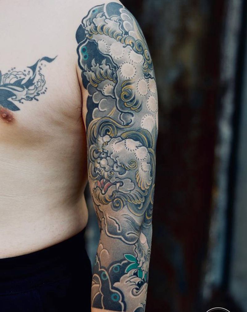 恢复后的唐狮臂纹身图片_老传统重庆纹身图案