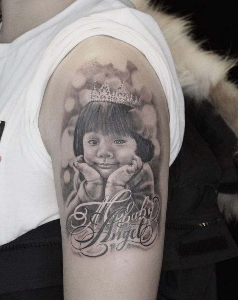 baby Angel纹身图片_手臂欧美写实纹身图案