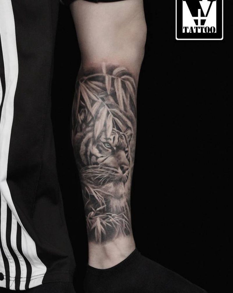 山中有猛虎纹身图片_腿部欧美写实纹身图案