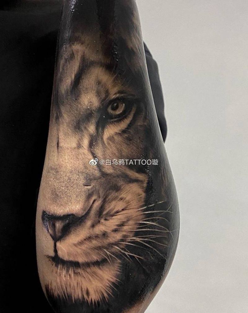 狮子纹身图片_手臂欧美写实纹身图案