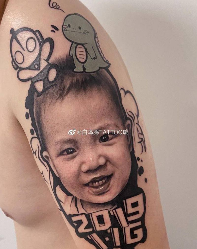 孩子照片纹身图片_手臂欧美写实纹身图案
