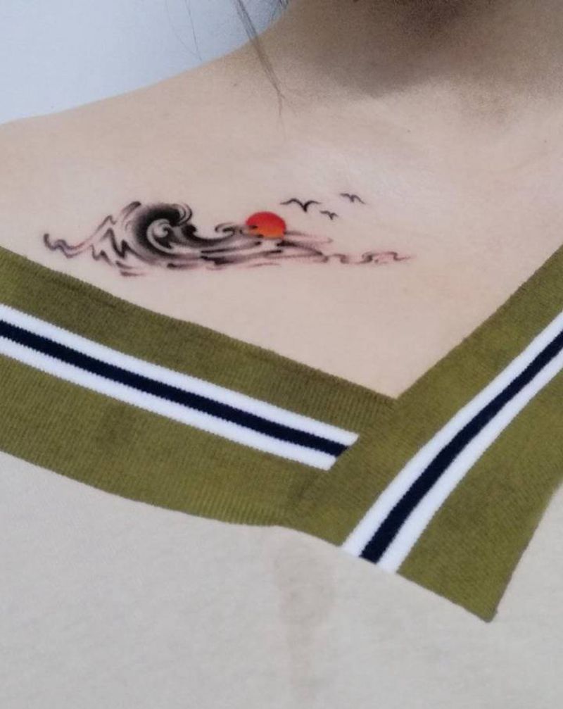 云雾纹身图片_肩部水彩几何纹身图案