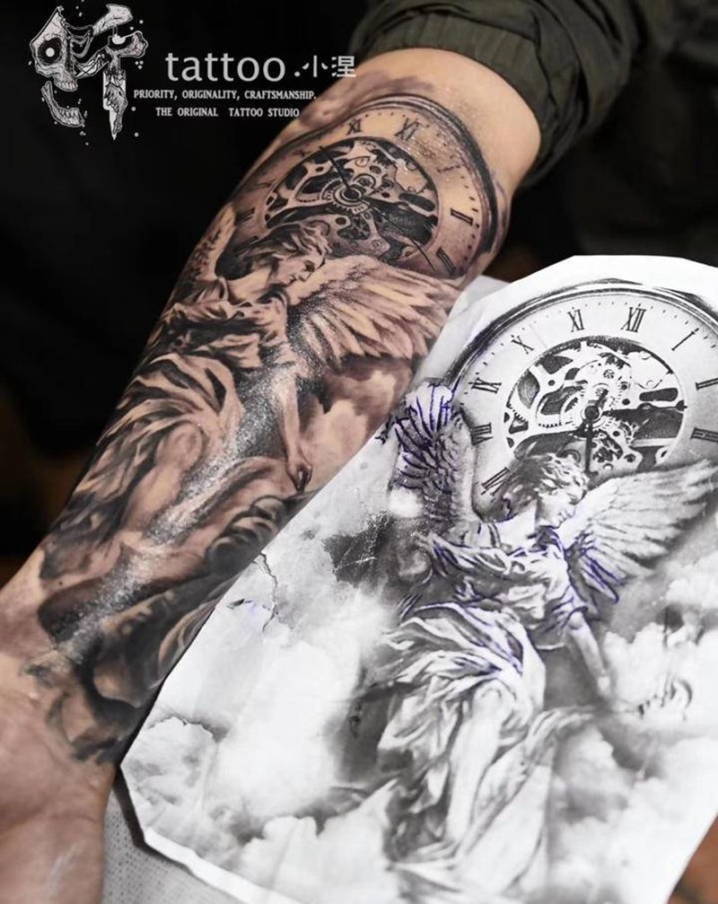 天使与表纹身图片_手臂欧美写实纹身图案