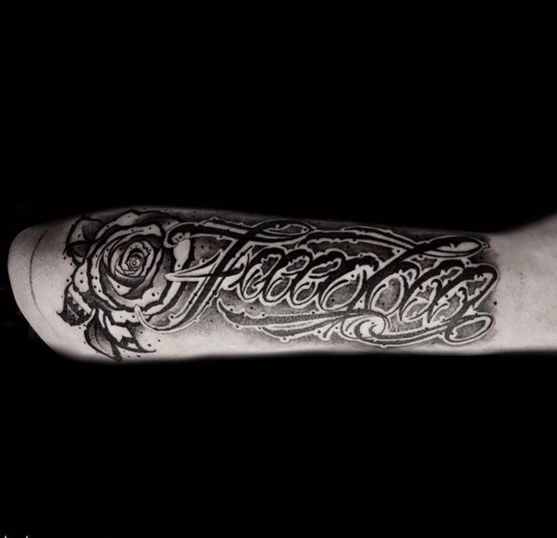 特价花体字纹身图片_手臂花体字纹身图案