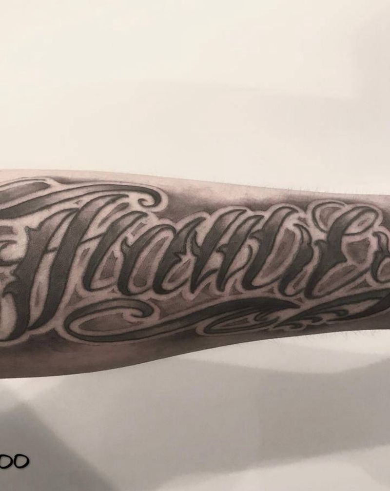花体修改纹身图片_手臂花体字纹身图案