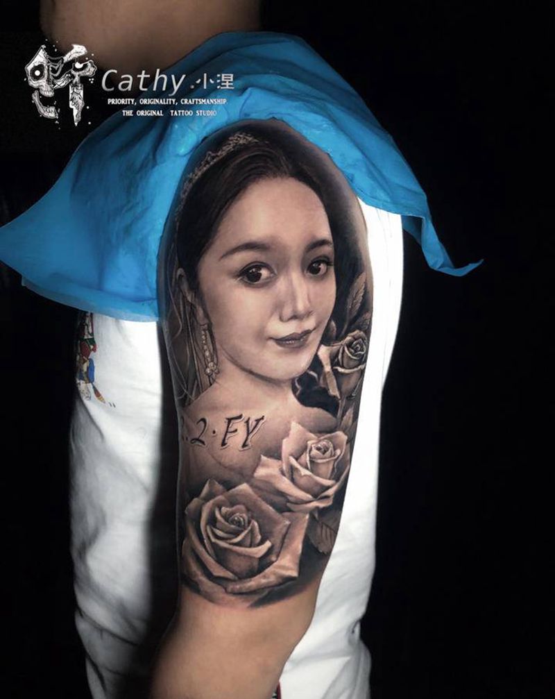 人像写实纹身图片_手臂欧美写实肖像新娘纹身图案