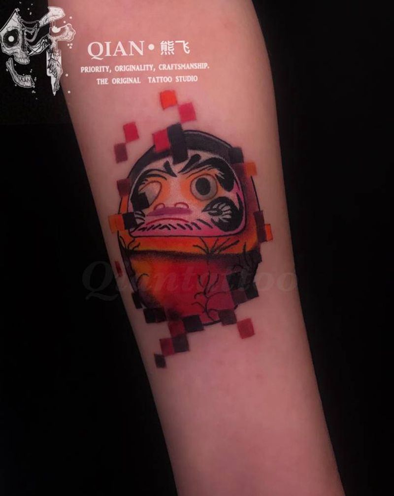 达摩蛋纹身图片_手臂卡通 达摩蛋重庆纹身图案