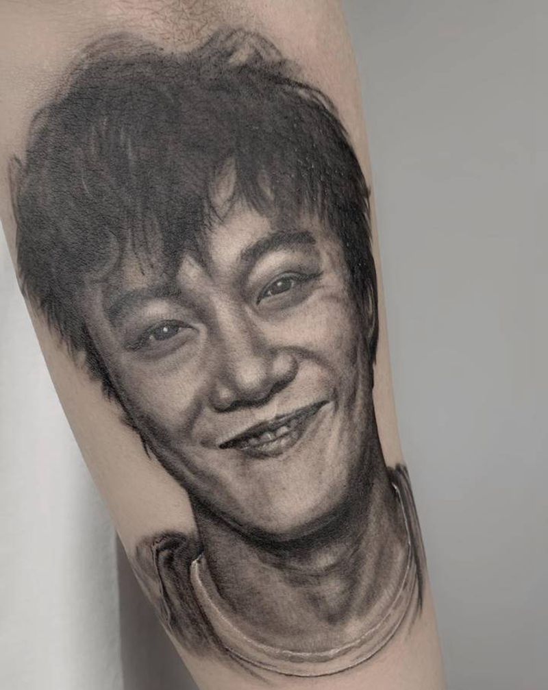 Eson陈纹身图片_手臂欧美写实纹身图案