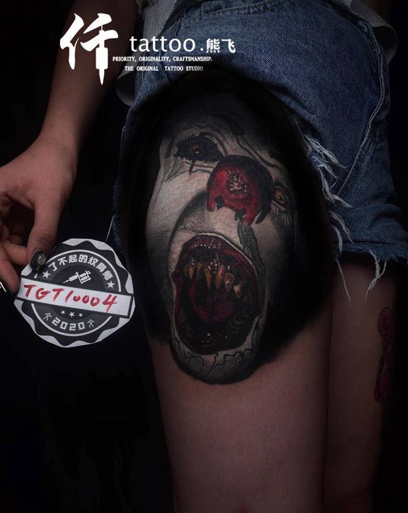 暗黑写实小丑纹身图片_腿部欧美写实暗黑血腥纹身图案