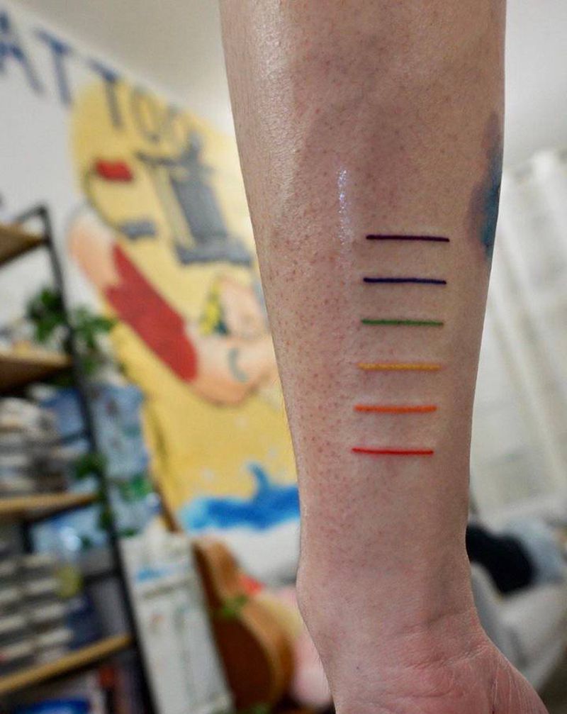 彩虹纹身图片_手臂纹身图案