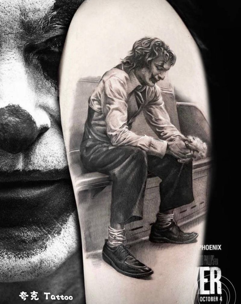 小丑纹身图片_手臂欧美写实纹身图案