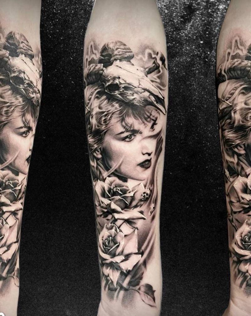 奥黛丽•赫本纹身图片_手臂欧美写实赫本花羊头纹身图案