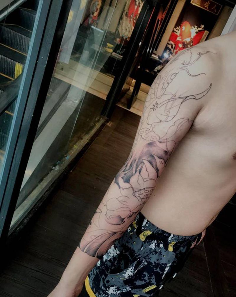 七分袖纹身图片_手臂新传统纹身图案