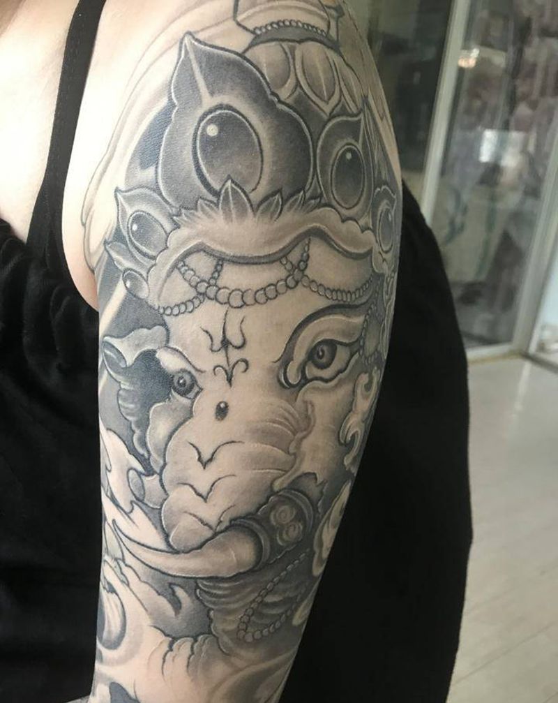 大臂象神恢复纹身图片_臀部纹身图案