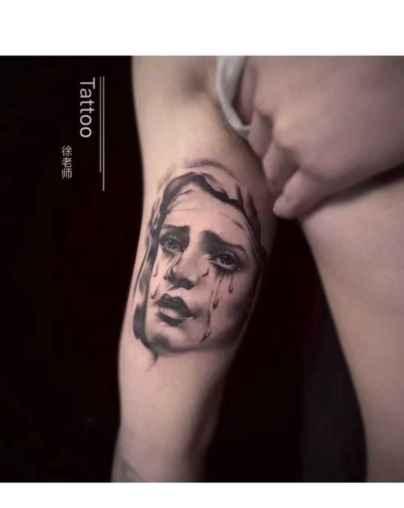 圣母纹身图片_手臂欧美写实肖像纹身图案