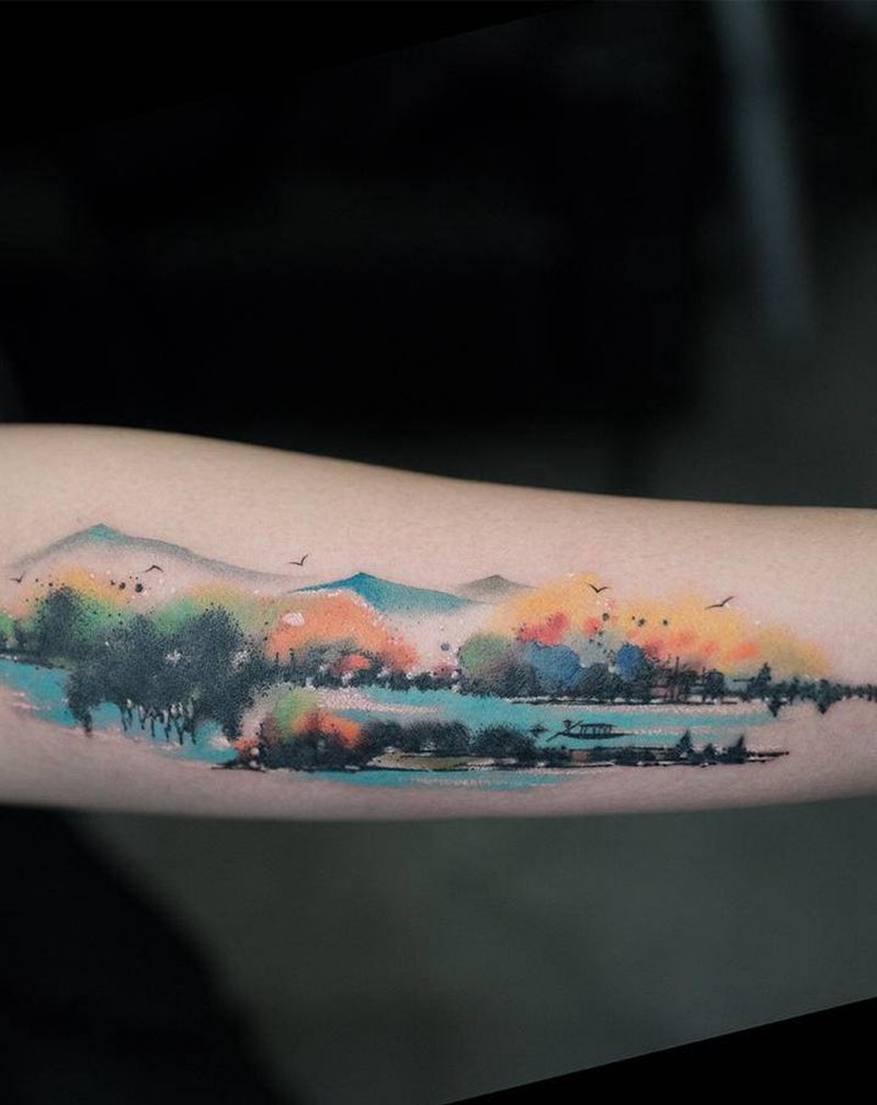 盼暖春来纹身图片_手臂水彩纹身图案