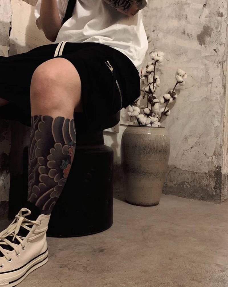 花腿（小腿）纹身图片_腿部脚部老传统牡丹云纹身图案