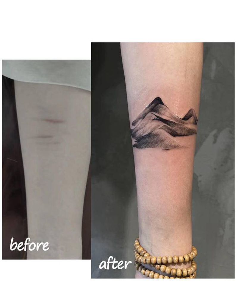 遮盖纹身图片_手臂水墨纹身图案