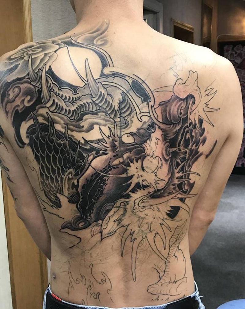 待续纹身图片_背部纹身图案