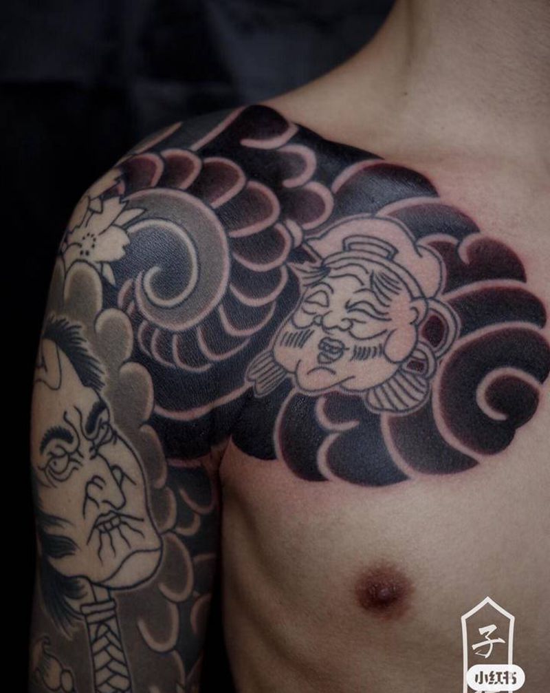 生首七分袖纹身图片_手臂老传统生首蛙纹身图案