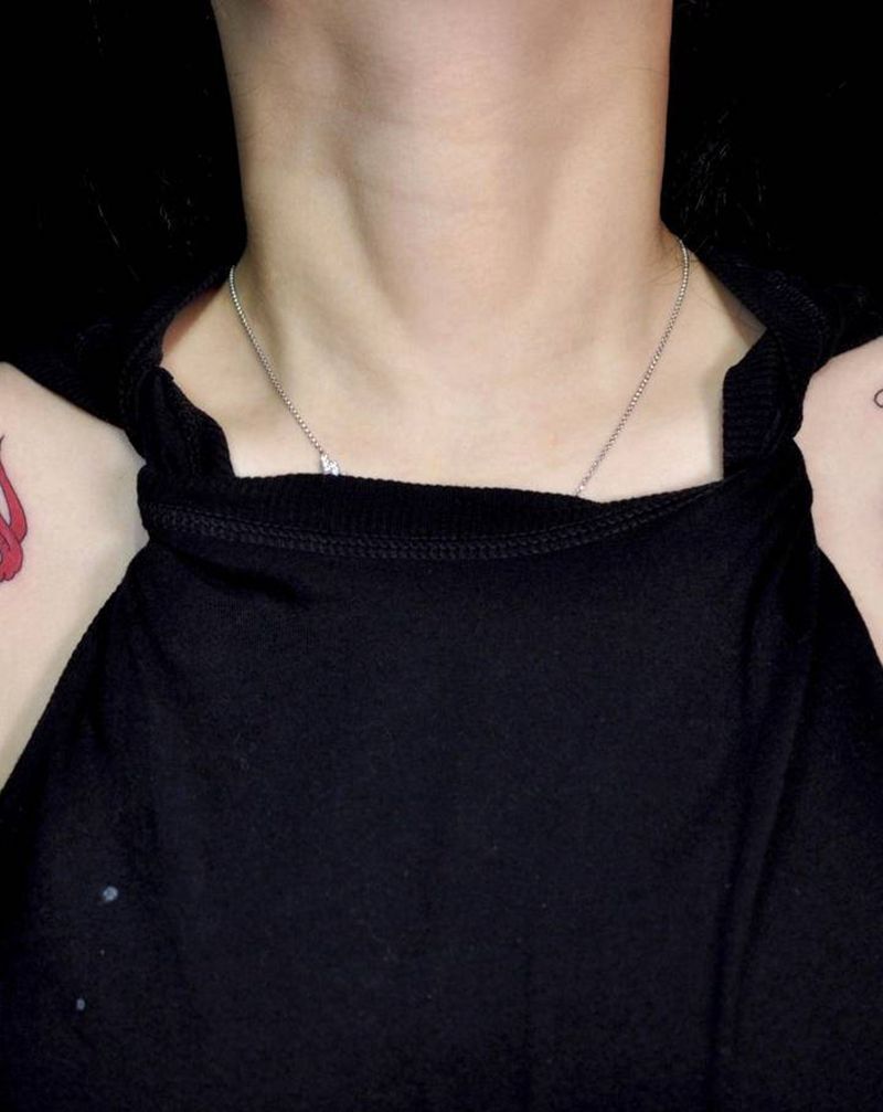 火男与阿多福纹身图片_肩部老传统纹身图案