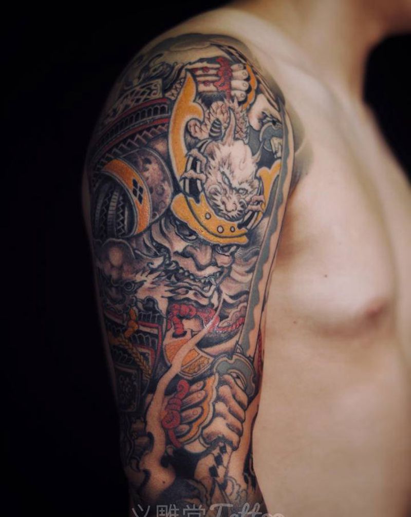 鬼武士达摩蛋纹身图片_手臂老传统纹身图案