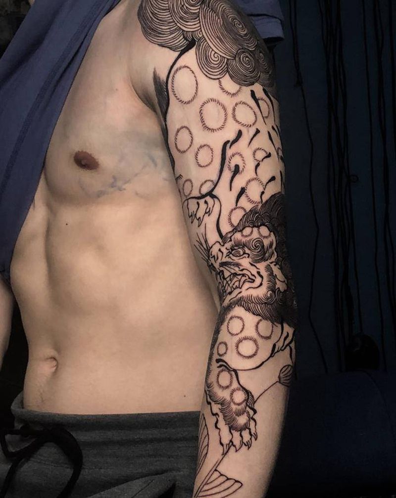 唐狮花臂纹身图片_手臂老传统唐狮花臂纹身图案