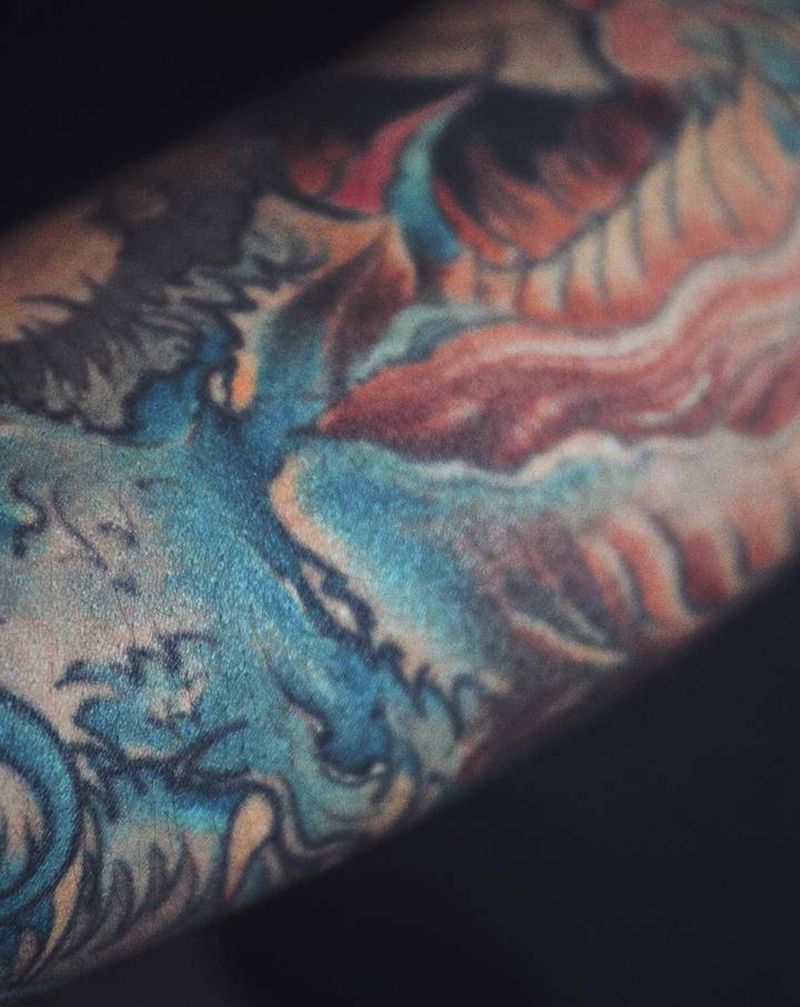 应龙•恢复后纹身图片_手臂新传统应龙纹身图案