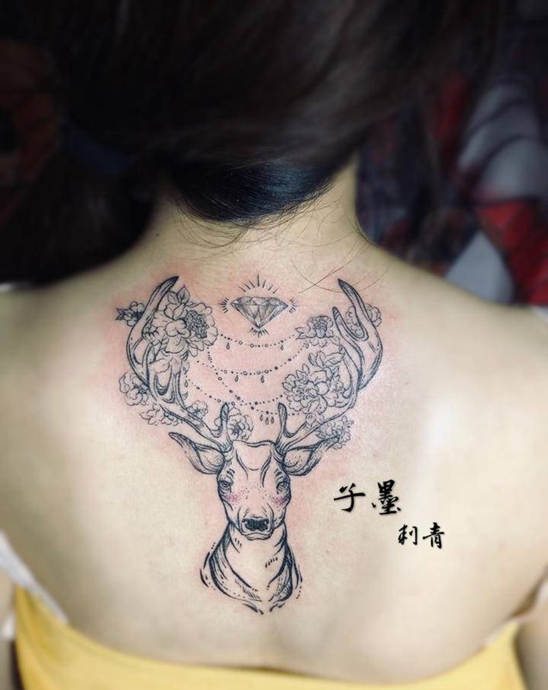 lu纹身图片_背部点刺纹身图案