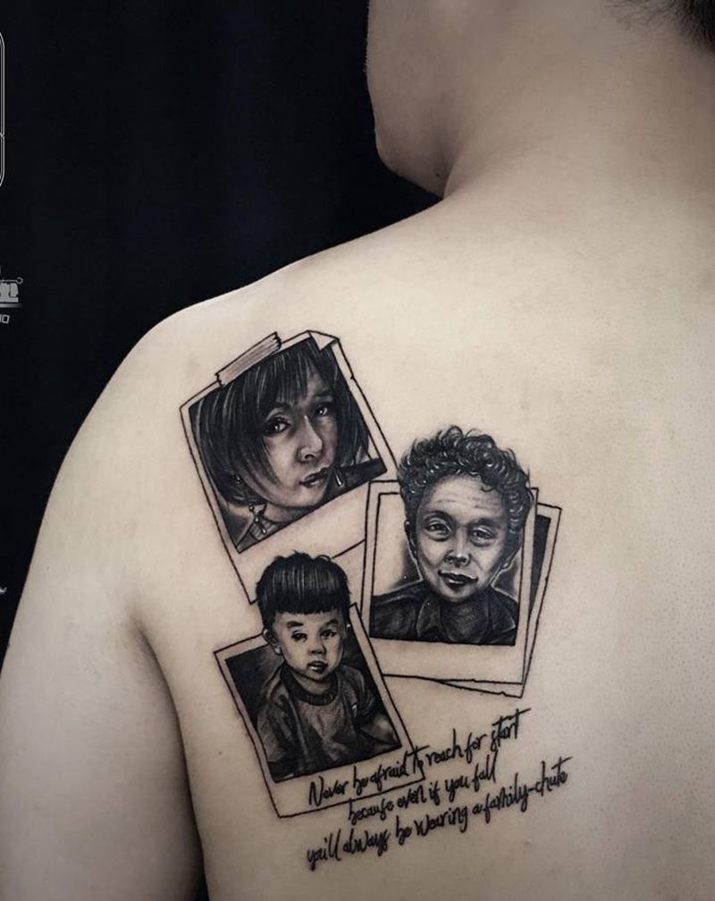 阖家纹身图片_背部欧美写实纹身图案