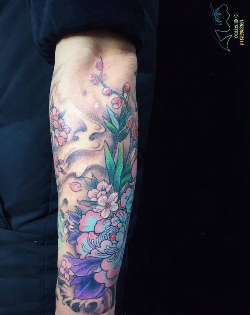 牡丹花纹身纹身图片_手臂新传统纹身图案