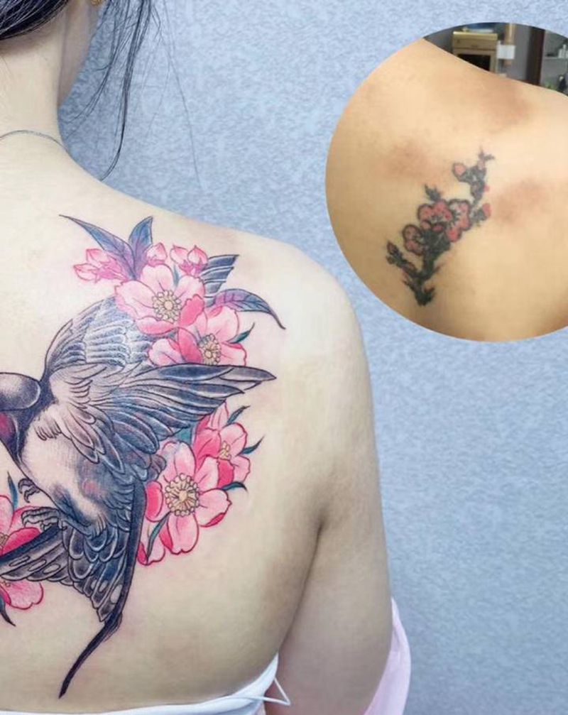 旧纹身遮盖喜鹊樱花纹身图片_背部水彩纹身图案