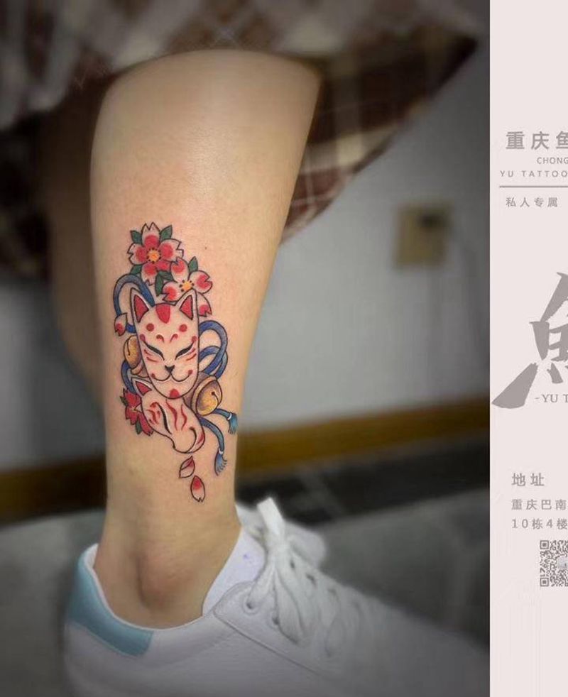 招财狐狸面具纹身图片_腿部New School纹身图案