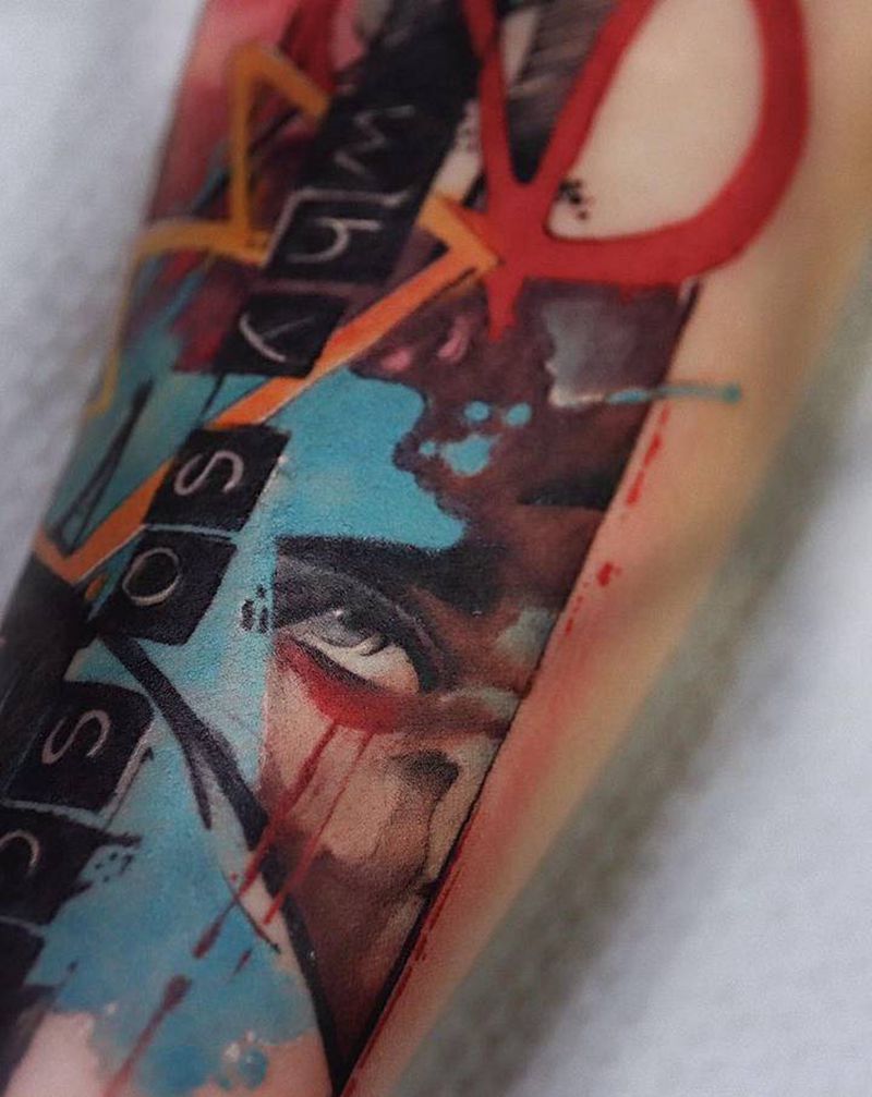 审视纹身图片_手臂水彩纹身图案