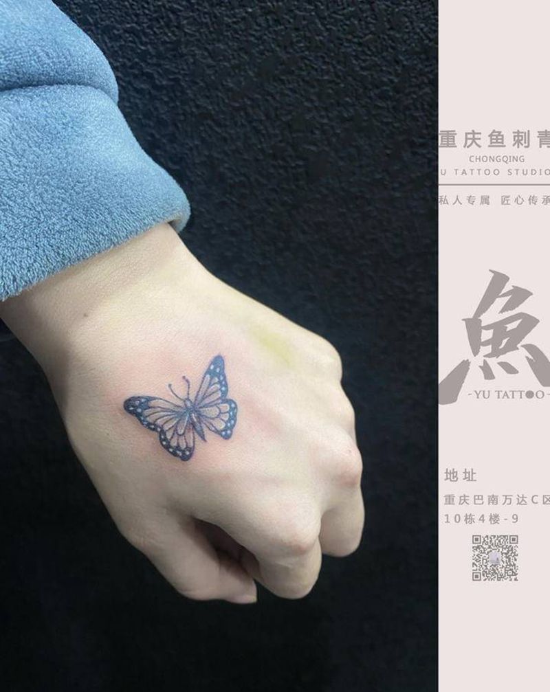 蝴蝶纹身纹身图片_手部点刺纹身图案