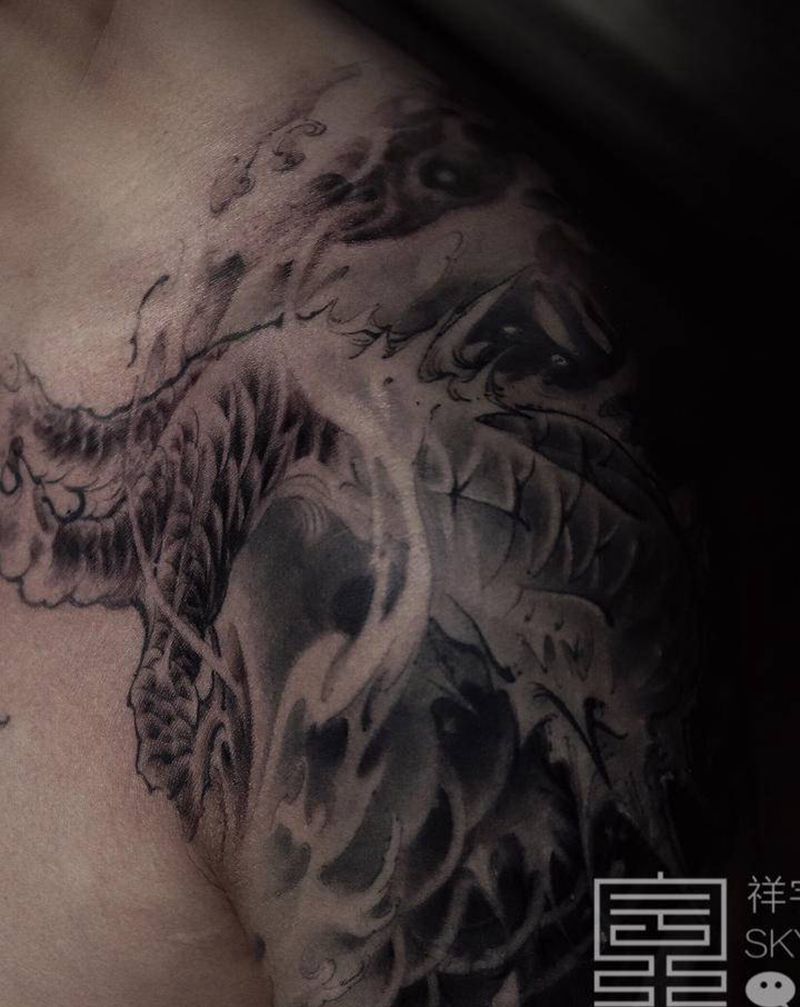 破浪 二纹身图片_手臂肩部新传统浪花纹身图案