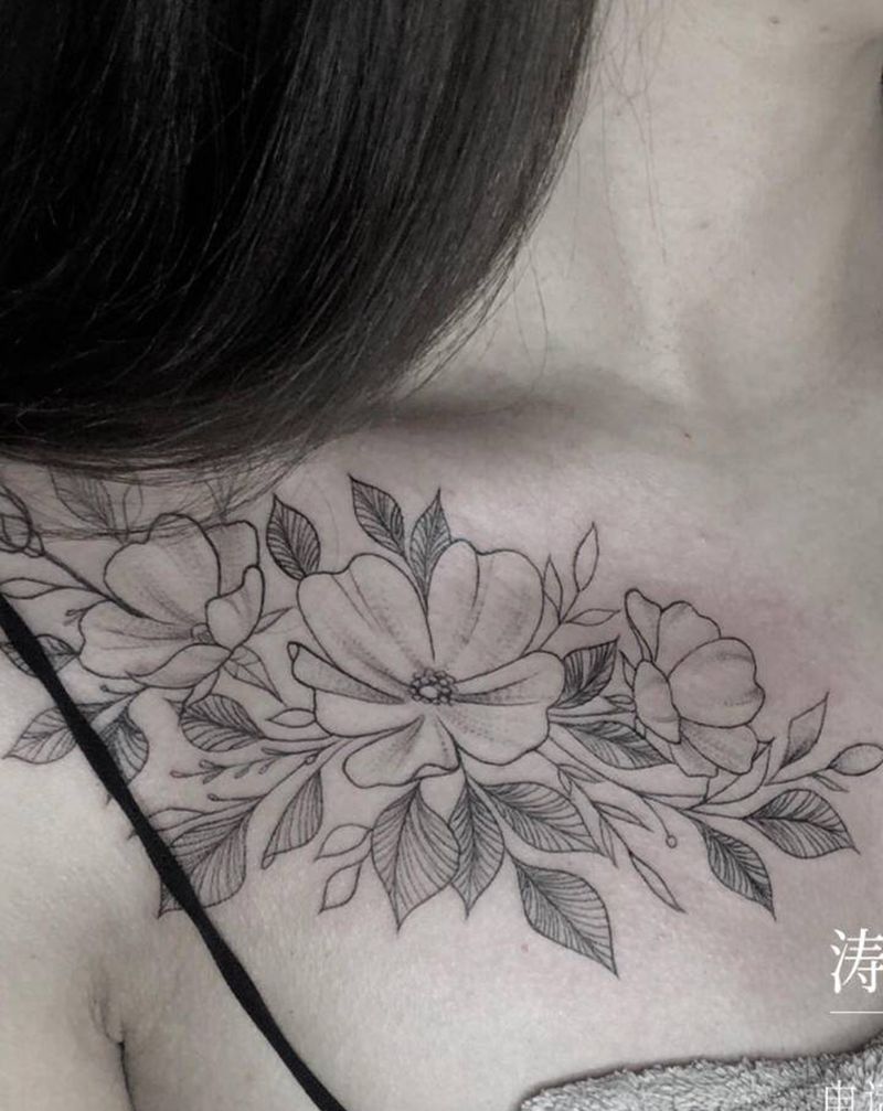 素花纹身图片_胸部纹身图案