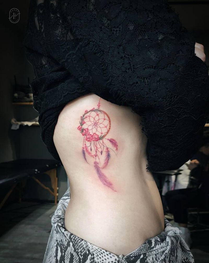 捕梦网纹身图片_腰部欧美写实单针纹身图案