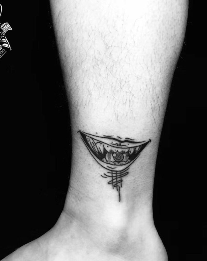 写轮眼纹身图片_腿部脚部几何点刺纹身图案