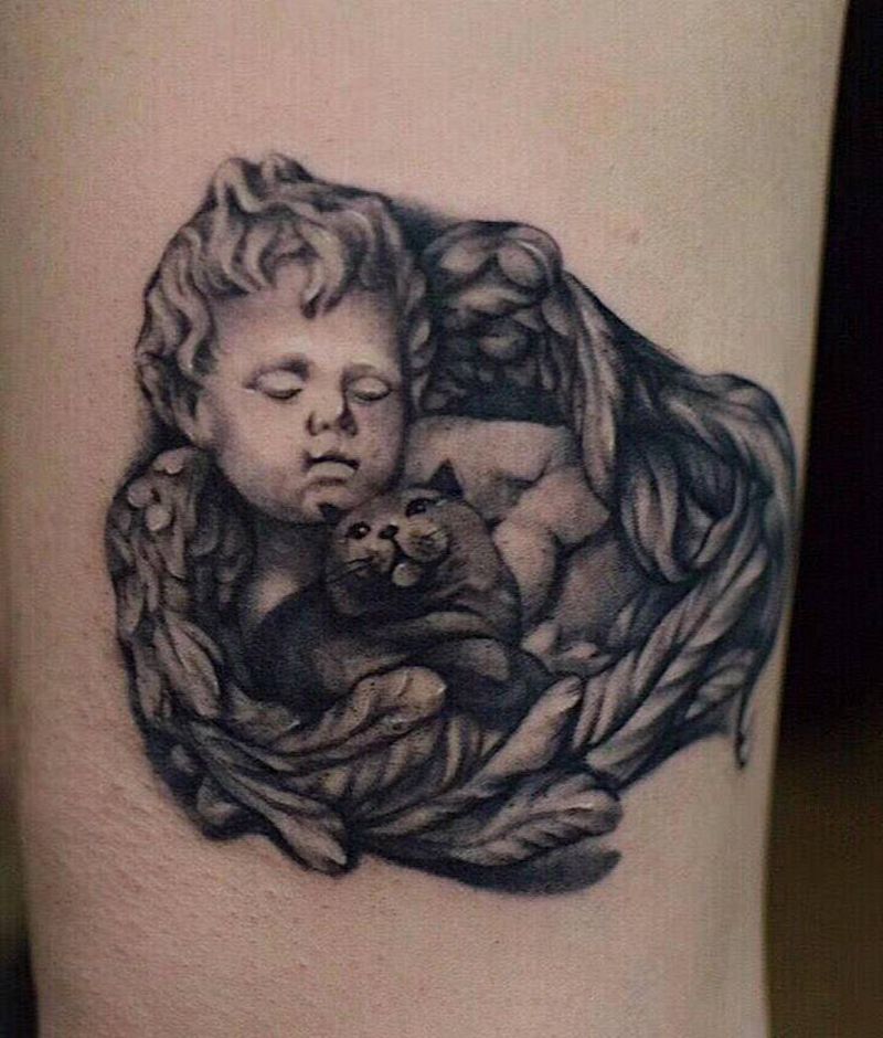 天使纹身图片_腿部欧美写实纹身图案