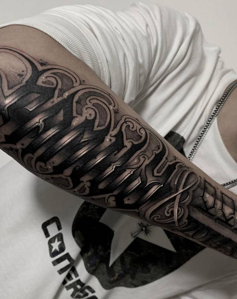 Family 写字纹身图片_手臂花体字纹身图案