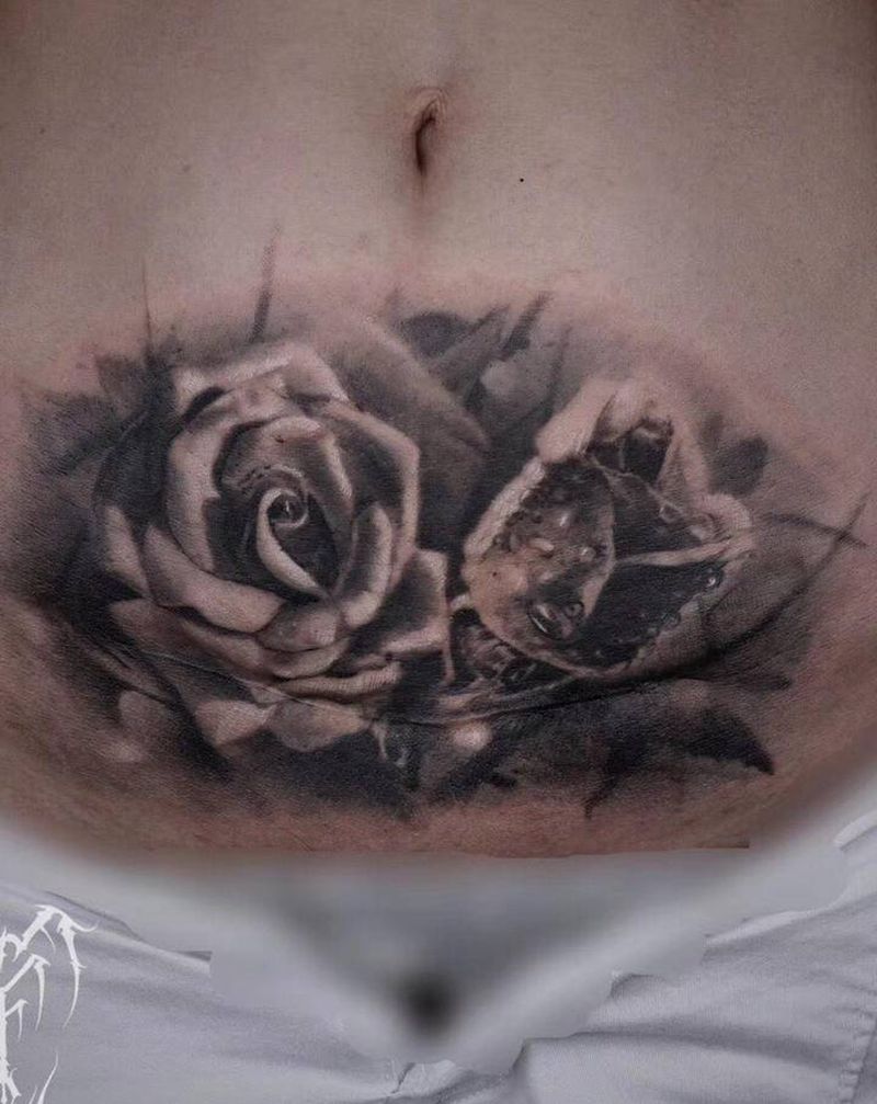 剖腹疤痕妊娠纹花朵遮盖纹身图片_腹部欧美写实遮盖疤痕纹身图案