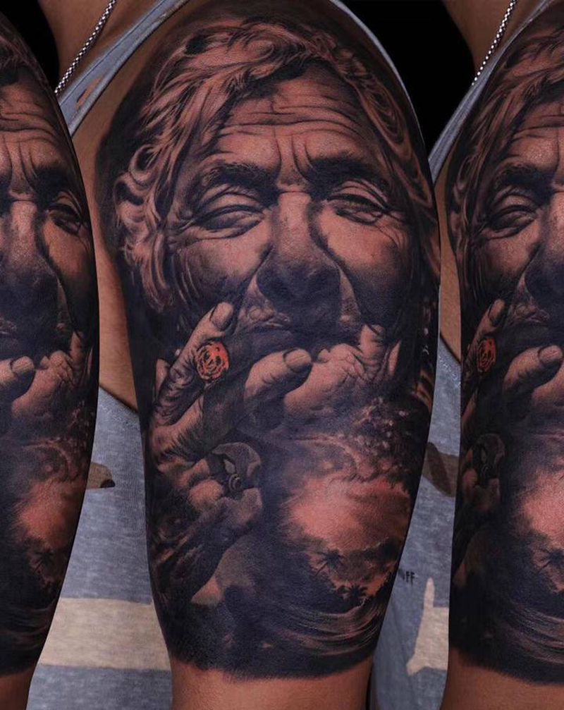 老人与海写实肖像纹身图片_手臂肩部欧美写实纹身图案