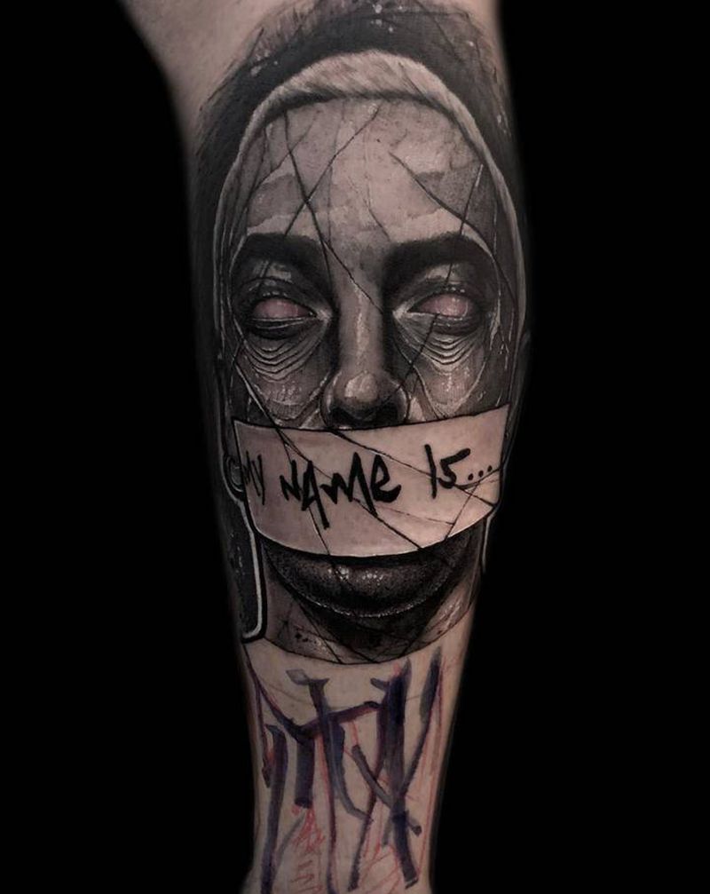 Eminem纹身图片_腿部欧美写实花体字纹身图案