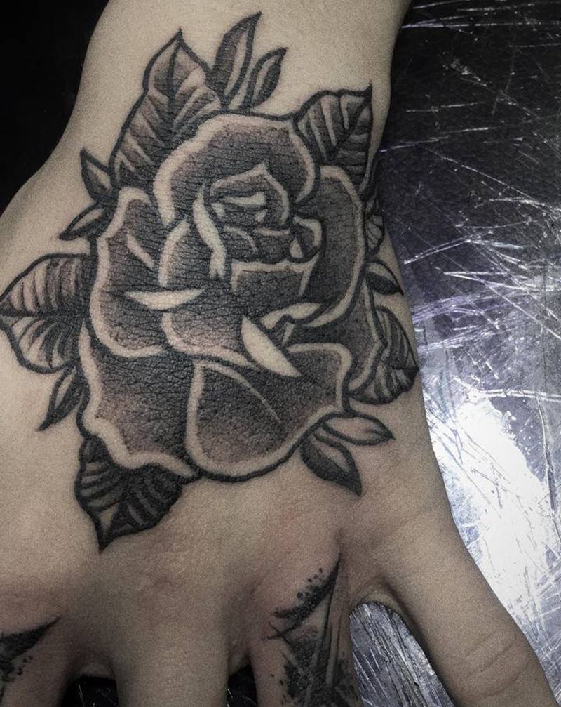 大概是玫瑰花吧纹身图片_手部点刺Old School纹身图案