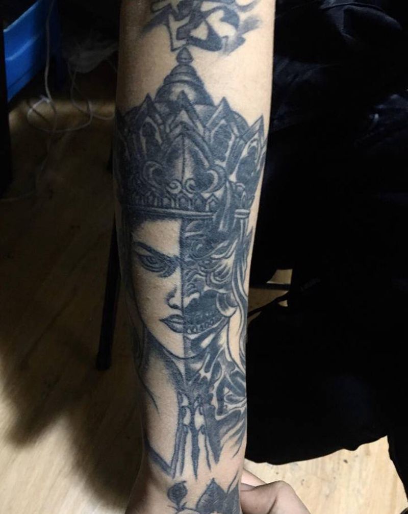 遮盖纹身图片_手臂欧美写实点刺遮盖纹身图案